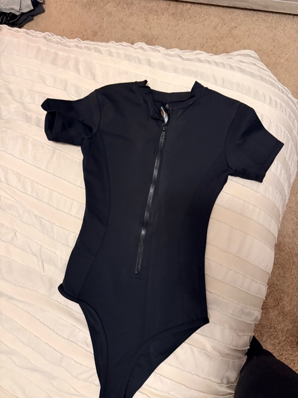 PrettyLittleThing Black Short-Sleeve One-Piece with Front Zip